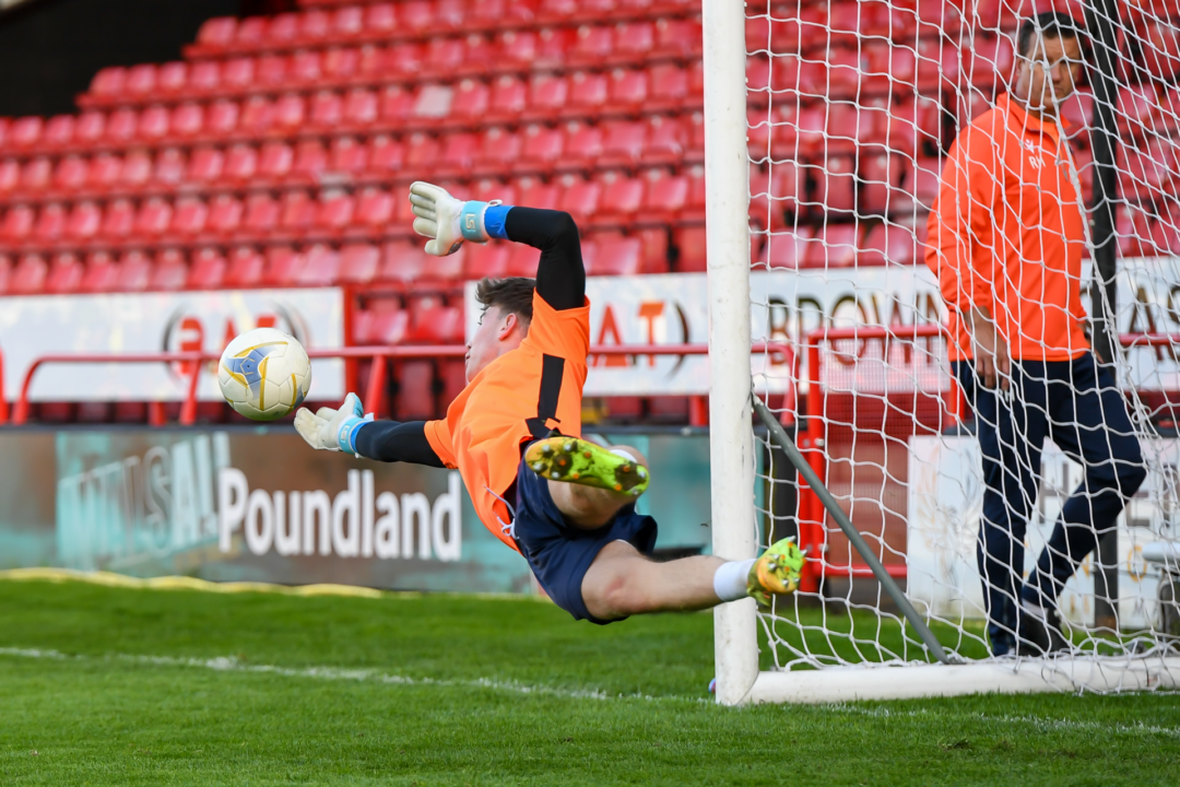 Goal keeper making a save